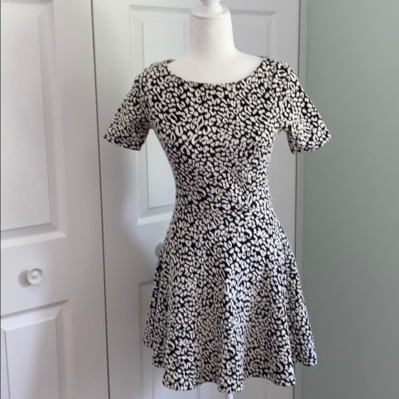 Guess Dresses & Skirts - Guess brand mini dress with cute open back size XS